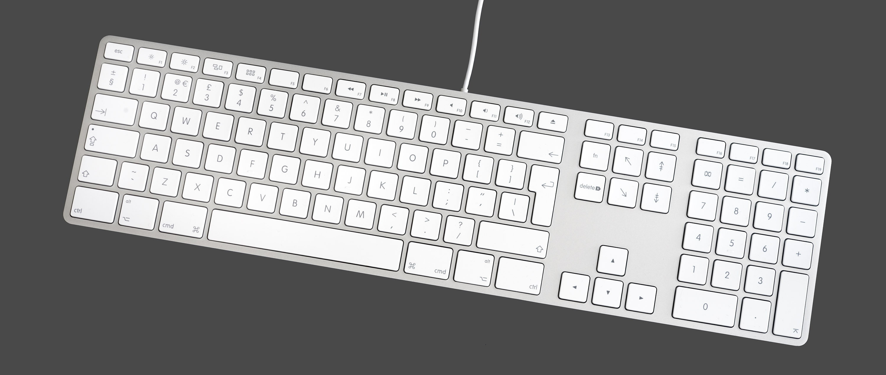 Apple keyboard - used under CC-BY-SA from https://commons.wikimedia.org/wiki/File:Apple_Keyboard_with_Numeric_Keyboard_9612.jpg